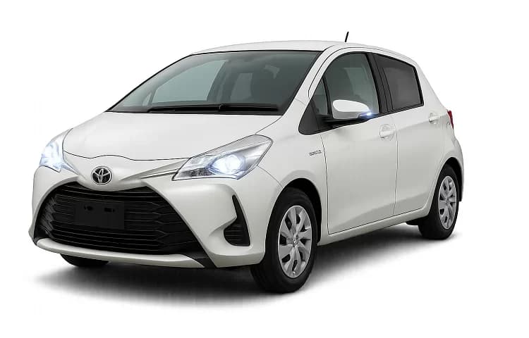 White Toyota Vitz hybrid hire car for collection at Paphos Airport, from 45 euro a day