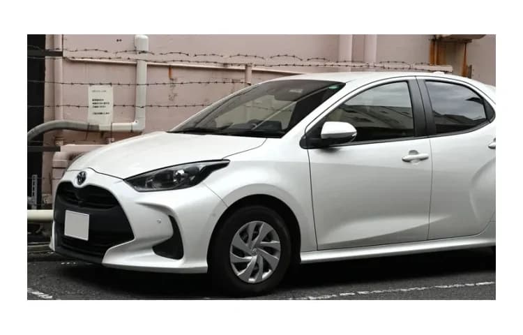 White Toyota Yaris Hybrid hatchback for Limassol, from 50 euro a day